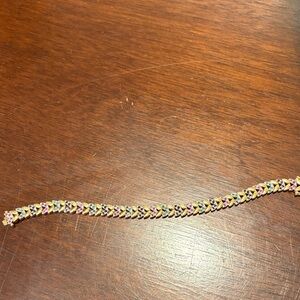 Elegant Gold and Pink Bracelet